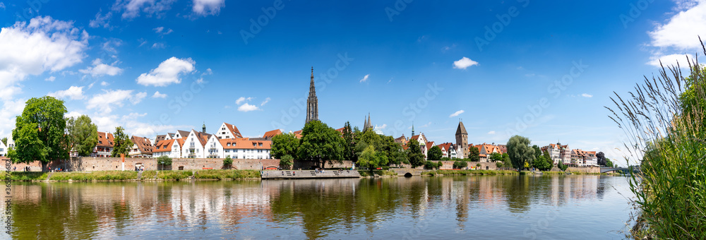 Fototapeta premium panorama view of the city of Ulm in southern Germany with the Danube River in front