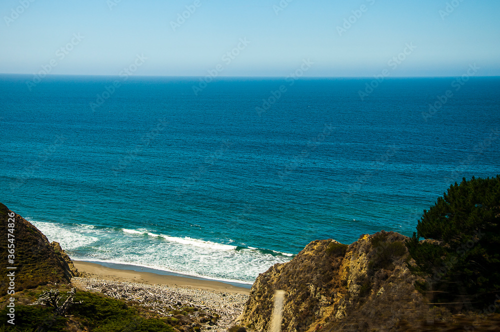 Big Sur is a sparsely populated region of the Central Coast of California where the Santa Lucia Mountains rise abruptly from the Pacific Ocean. 
