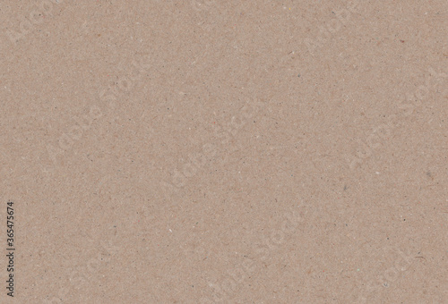 Textured brown coloured carton paper background. Extra large highly detailed image.