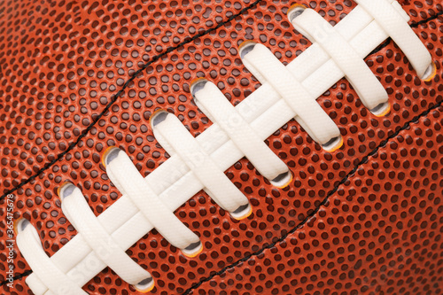 Close-up or marco shoelace of American leather football, full frame, rugby ball.