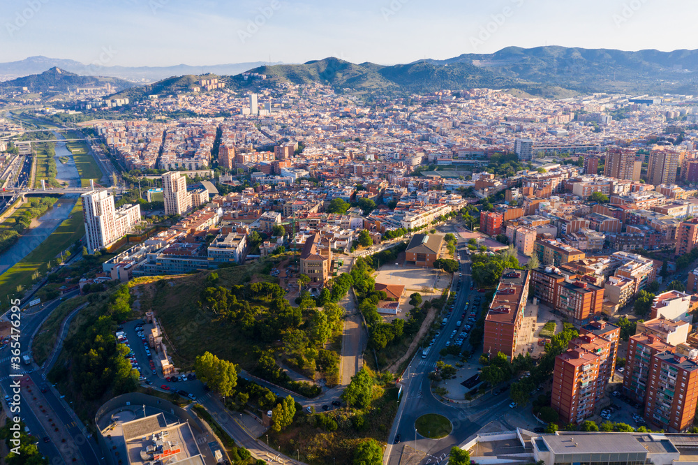 Aerial urban landscape of Santa Coloma de Gramenet municipality and Besos river, Catalonia, Spain
