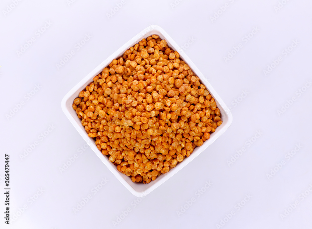 Fried and Spicy Chana Masala Dal, white bowl on dark background Fried and Spicy Chana Masala Dal, white bowl on dark background
