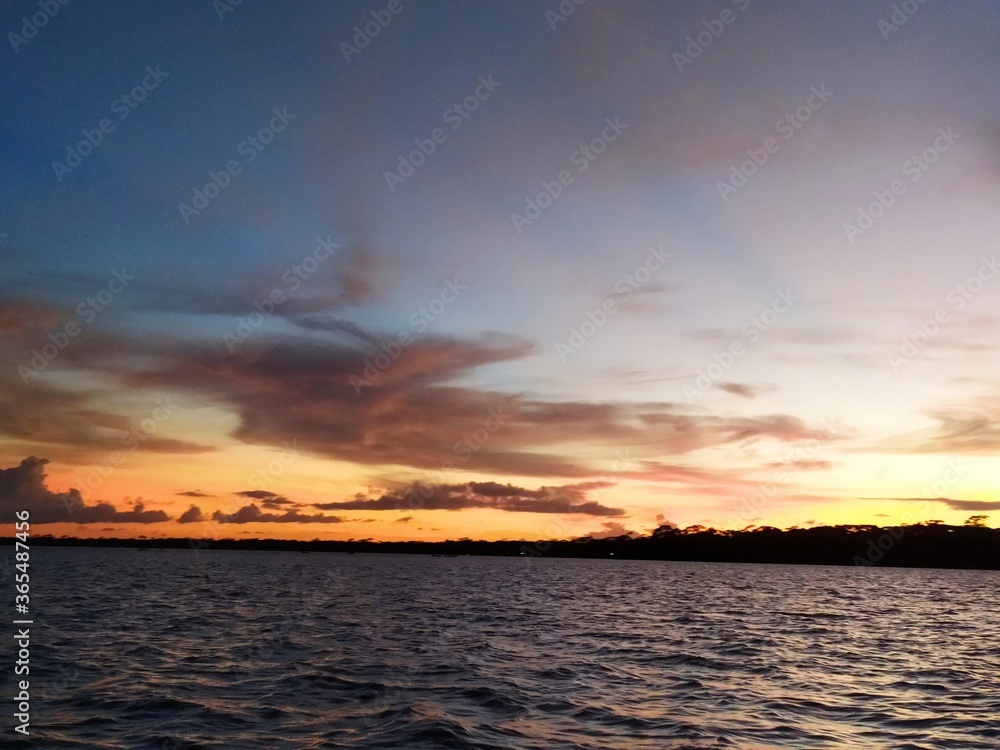 Naklejka premium sunset at the beach