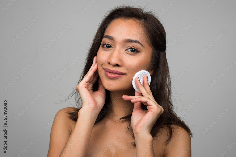 Portrait of young beautiful Asian woman shirtless Portrait of young beautiful Asian woman shirtless