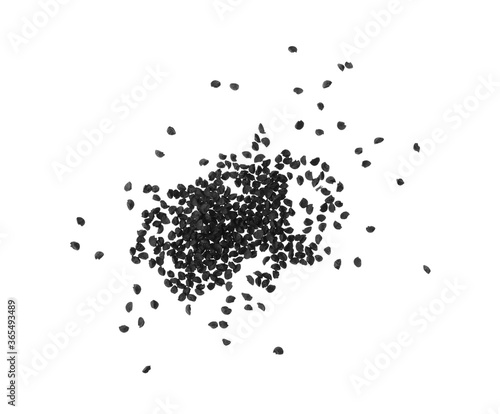 Pile of raw onion seeds on white background, top view. Vegetable planting