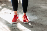 Close-up of red pair of female fitness sneakers.