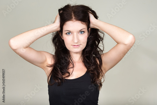 Portrait of young beautiful woman with brown hair