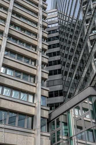 Glass Facade Of Modern Office Buildings With Reflections Of Neighboring Towers In The City Of Vienna