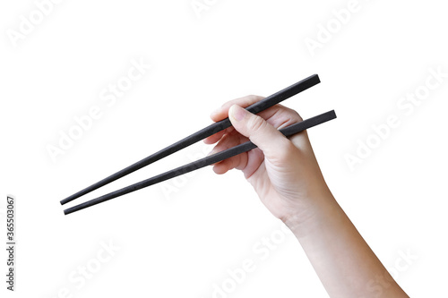 Hand with chopsticks Isolated on white background