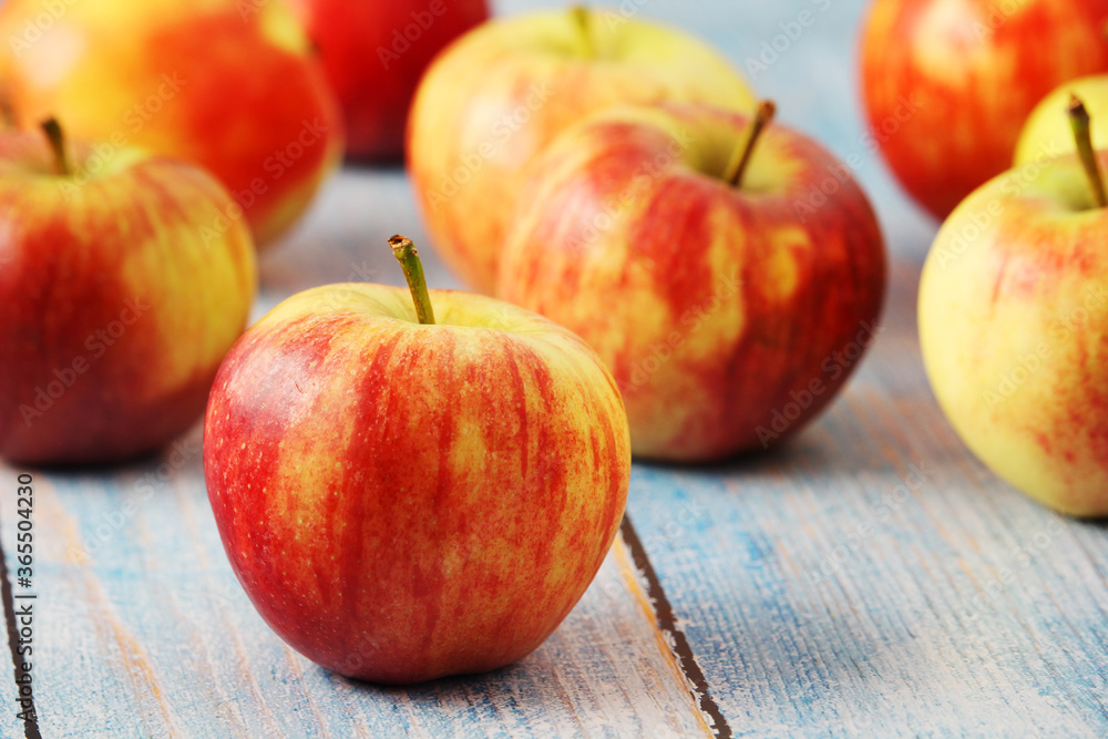 Several ripe red apples on the wooden table Several ripe red apples on the wooden table