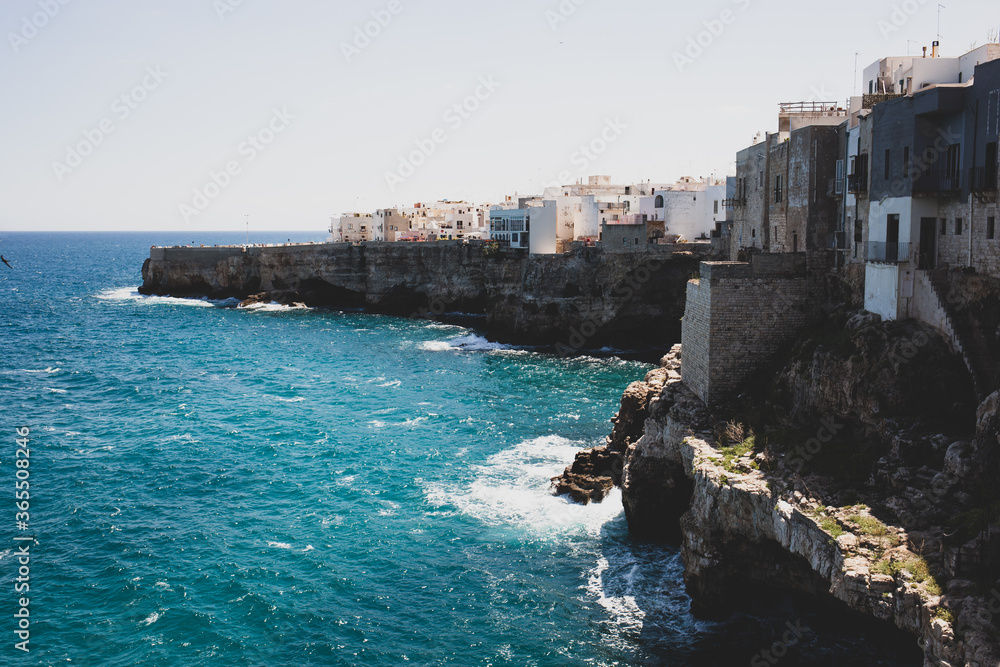 View of Polignano a mare, picturesque little town on cliffs of the Adriatic Sea. Apulia, Southern Italy.
