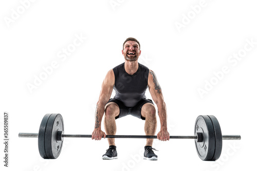 Fit Man Doing A Deadlift Exercise. Full length studio shot isolated on white.