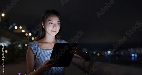 Woman use of tablet computer at outdoor