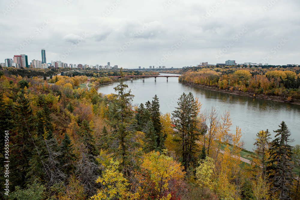 autumn landscape in the city with river