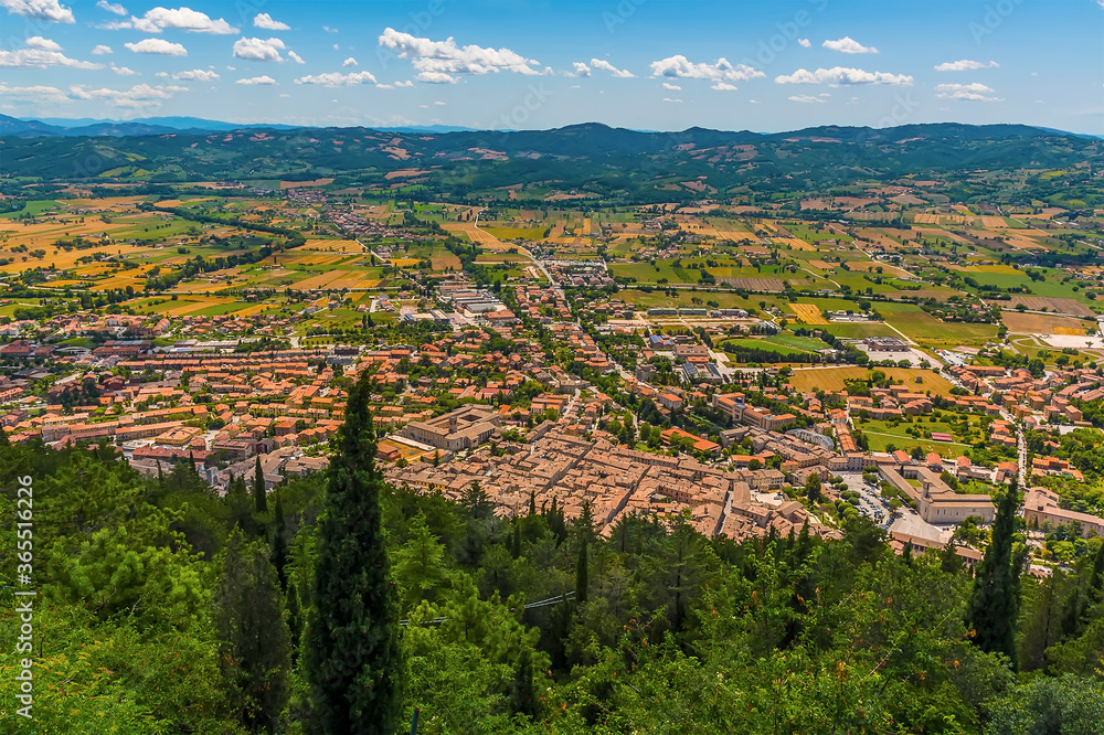 A view from the top of the Mount Ingino over the city of Gubbio, Italy in summer