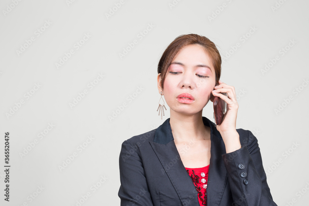 Portrait of Asian businesswoman against white background Portrait of Asian businesswoman against white background