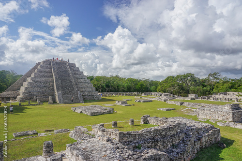 Mayapan, Mexico: Tourists visit the Mayan Temple of Kukulcan in Mayapan, the capital of the Maya in the Yucatán from the 1220s until the 1440s. photo