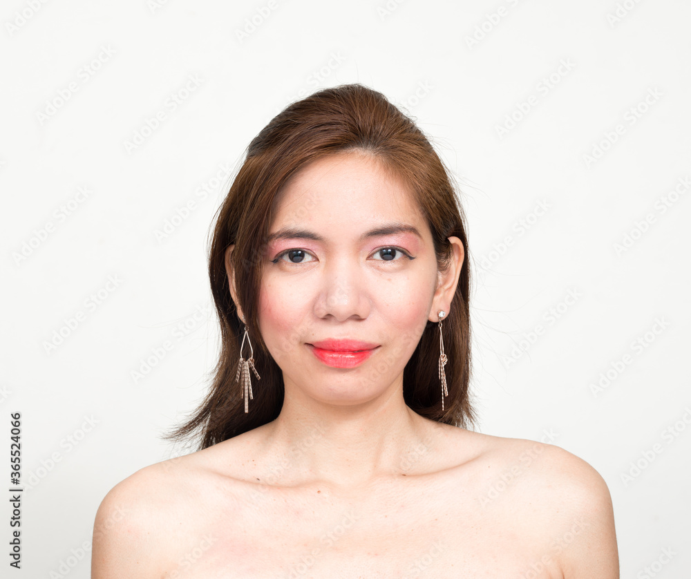 Portrait of Asian woman shirtless against white background Portrait of Asian woman shirtless against white background