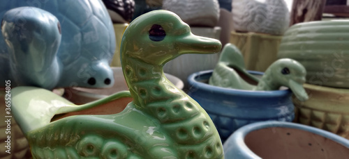 Green duck garden porcelain pot in a nursery for sale