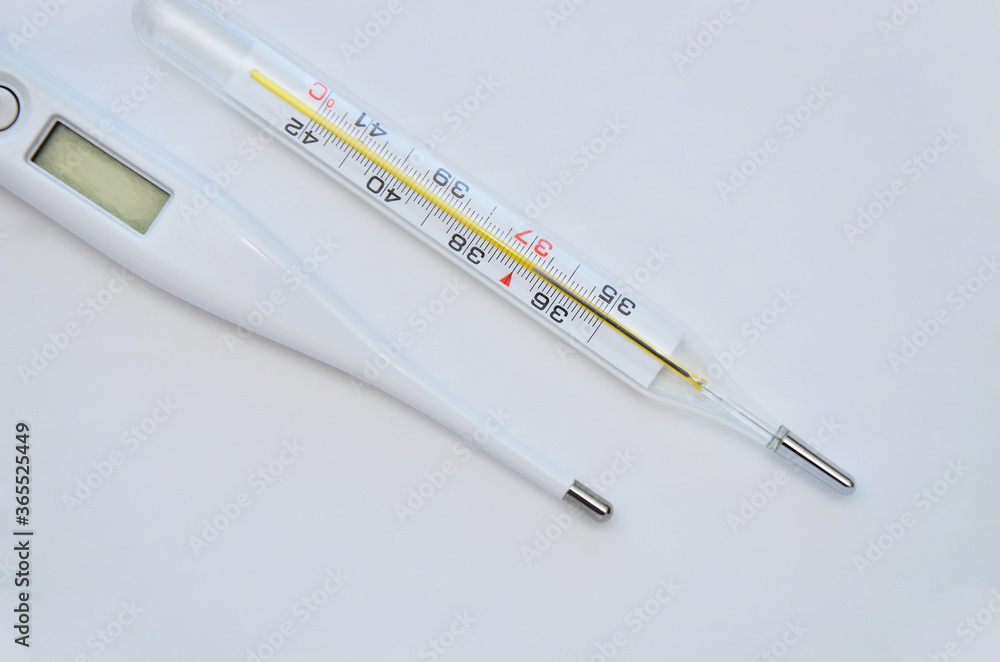 Two medical thermometers on a white background Two medical thermometers on a white background