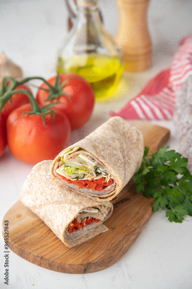 italian wrap with tomato and salami italian wrap with tomato and salami