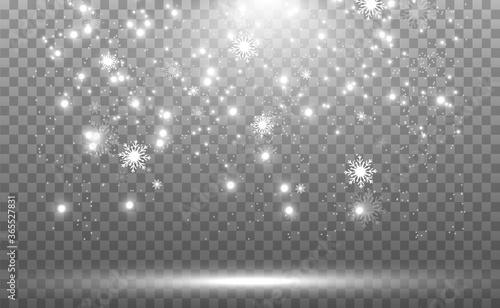 Snowfall. A lot of snow on a transparent background. Christmas winter background. Snowflakes falling from the sky.