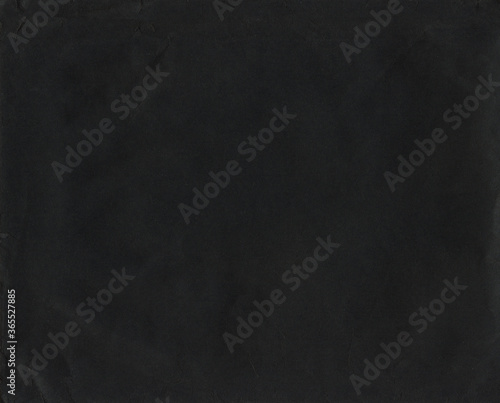 Old black paper background, crumpled paper texture