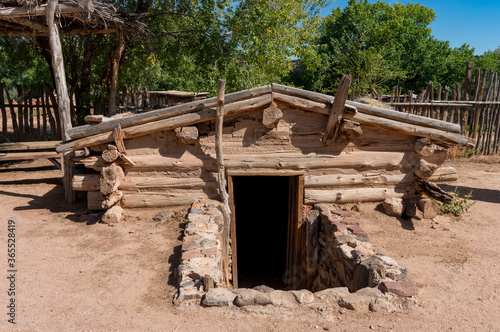 Doorway to Old Wooden and Stone Root Cellar photo