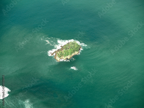Small green island in the middle of the Indian Ocean. Aceh, Indonesia