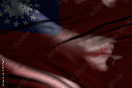 wonderful any holiday flag 3d illustration. - photo of dark Myanmar flag with folds lie in shadows with light spots on it