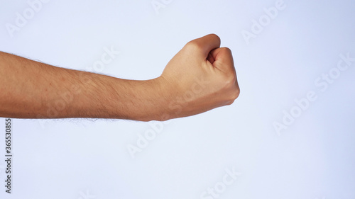 Male fist. gesture threatens and aggression on isolated white background