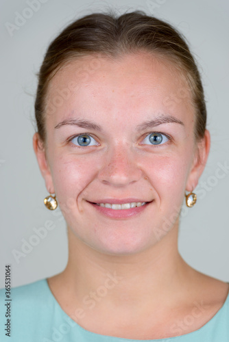 Studio shot of young beautiful blonde businesswoman