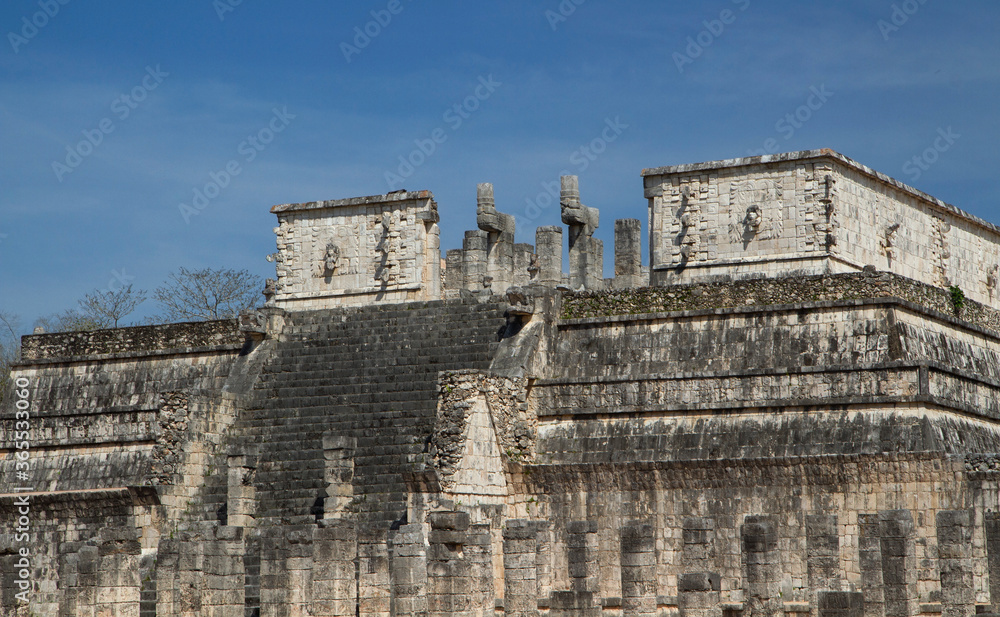 Architecture. Mayan ancient city ruins. Temple of the Warriors in Chichen Itza archaeological site, Yucatan, Mexico.
