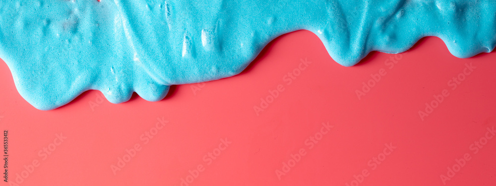 Blue slime isolated on pink background