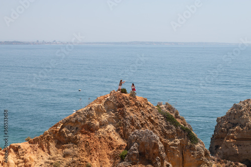 Algarve, Lisbon. Beautiful bay near Lagos town with high cliffs on the shore of the Atlantic Ocean. The Algarve is the southernmost region of continental Portugal. 