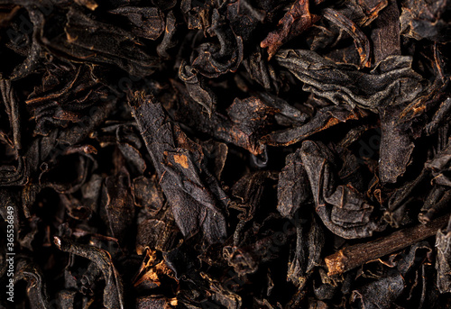 Close up of granules of black tea as a background.