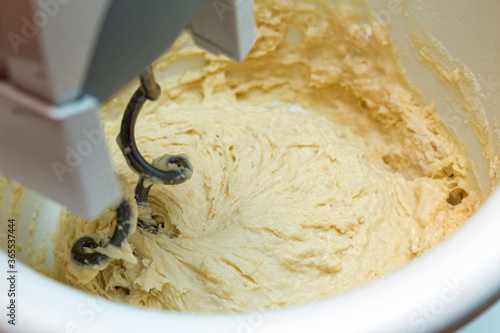 Kneading dough in a mixer close up