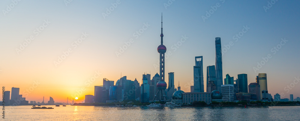 Sun rising over Shanghai - colorful dusk at the chinese metropolis.