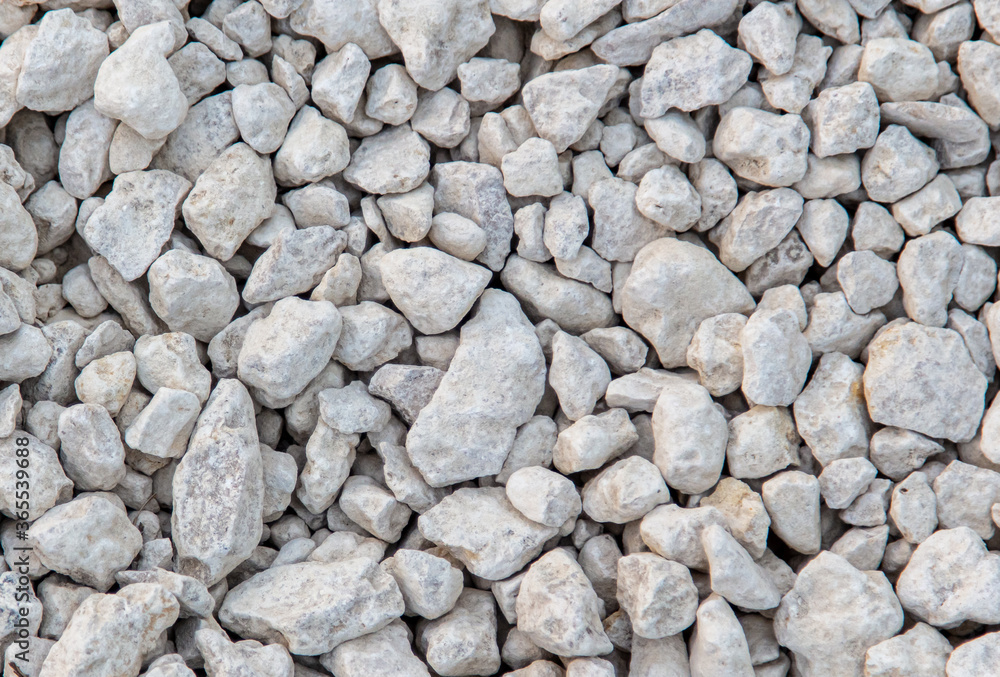 Stone gravel at a construction site as a background. Stone gravel at a construction site as a background.