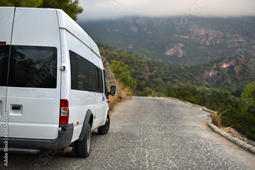 Tourist minibus on mountains road