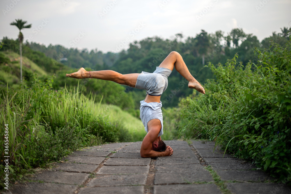 Fototapeta premium Man practice Yoga practice and meditation outdoor