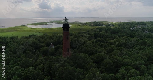 Historic Currituck Beach Lighthouse in Corolla, NC.  Aerial drone shot in the Outer Banks photo