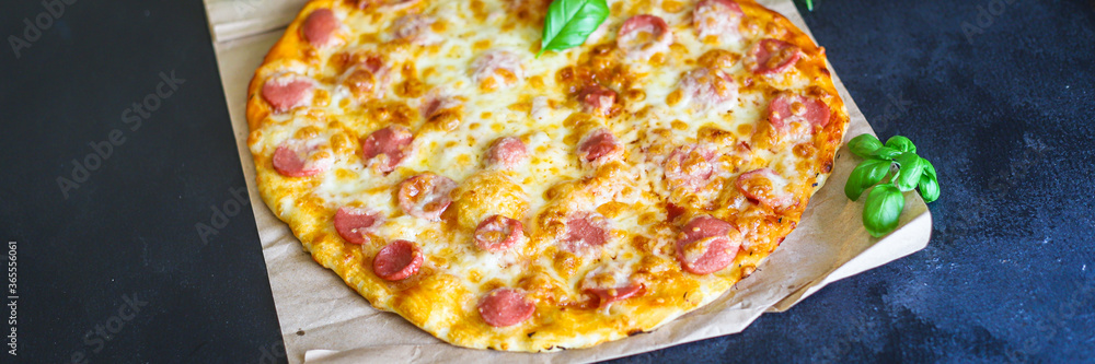 pizza salami sausages cheese classic recipe sauce fast food Takeaway Menu concept serving size. food background top view copy space organic eating
