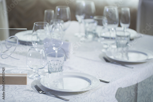 Elegant table set up for dinning room © Artem Zakharov