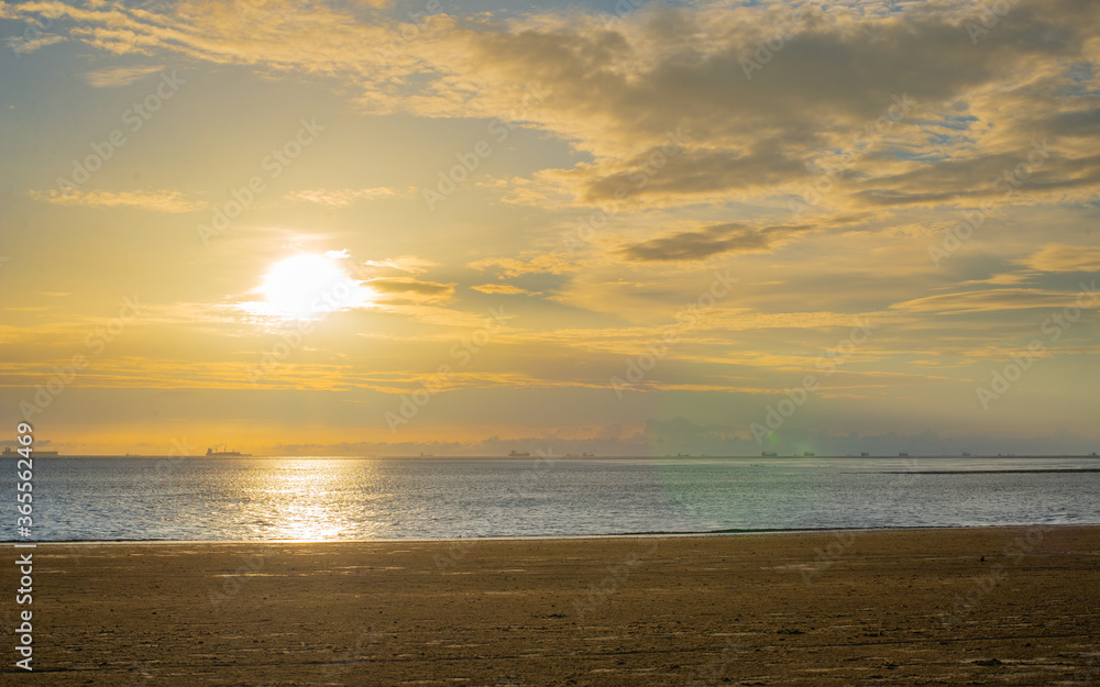 Sunrise sea beach sky landscape. Beautiful sun light reflection.
