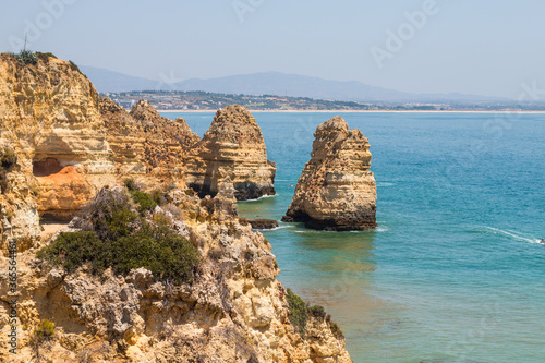 Algarve, Lisbon. Beautiful bay near Lagos town with high cliffs on the shore of the Atlantic Ocean. The Algarve is the southernmost region of continental Portugal. 