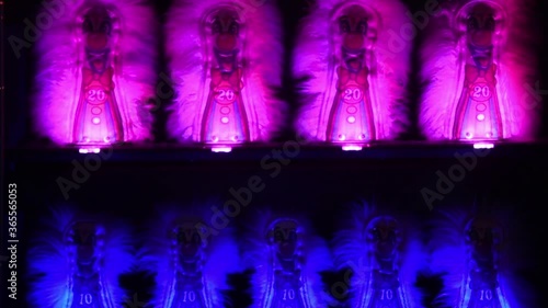 Lined up carnival game prizes with flashing lights