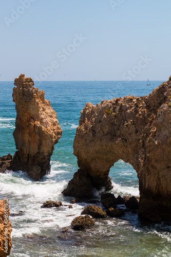 Algarve, Lisbon. Beautiful bay near Lagos town with high cliffs on the shore of the Atlantic Ocean. The Algarve is the southernmost region of continental Portugal. 