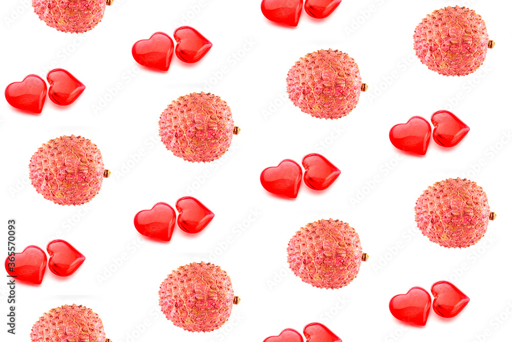 colorful pattern of lychees and hearts on a white background. the pattern of litchi. the view from the top colorful pattern of lychees and hearts on a white background. the pattern of litchi. the view from the top