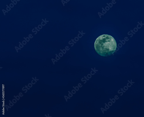 Full moon during blue hour © aminkorea